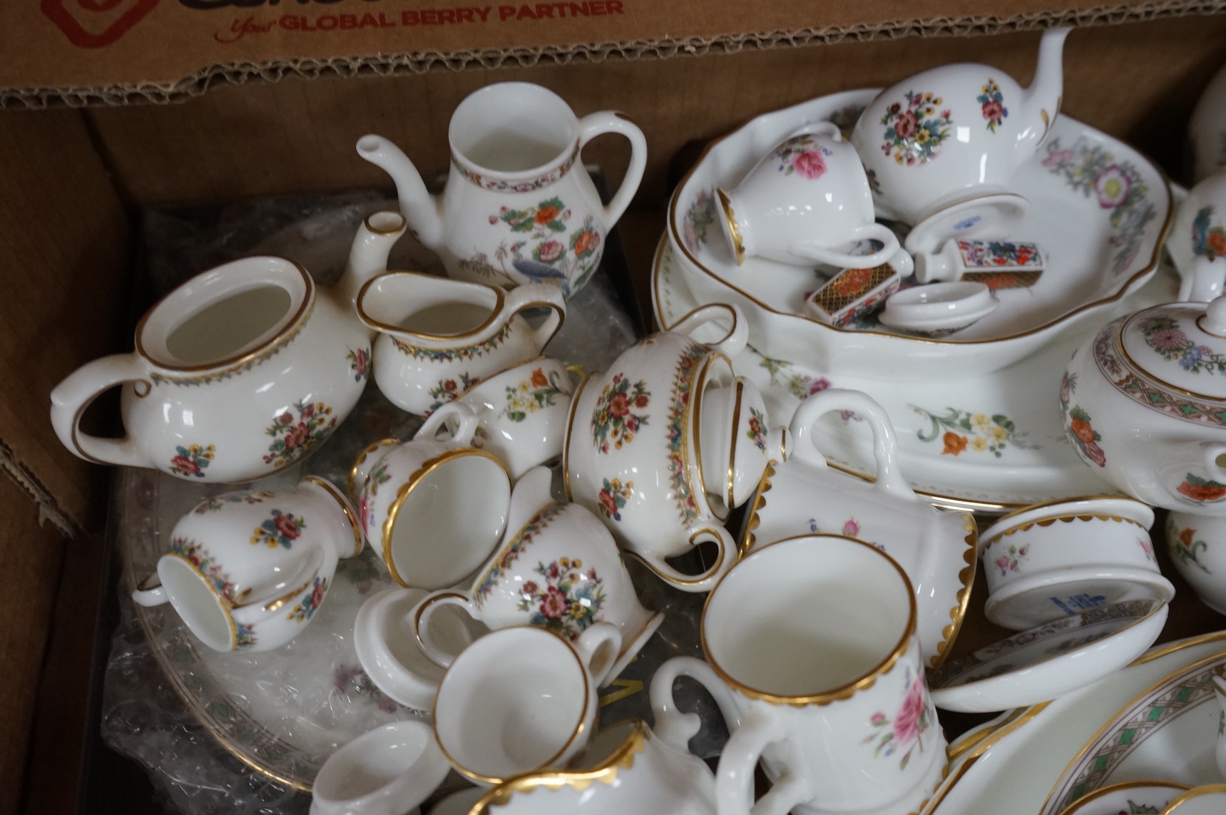A large collection of Wedgwood and Coalport miniature tea wares, largest piece 24cm wide